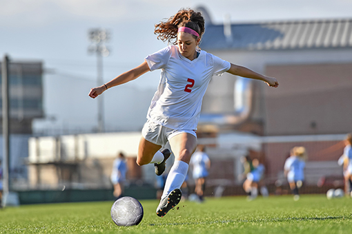 girlkickingtheball